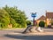 Day view of typical english brick roundabout with directional signs