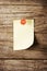 Day of week Sticky note with pin over wooden background