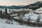 Daybreak winter Carpathian mountain village Zelene, Verkhovyna,