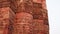 Daylight Elegance: Unveiling Qutub Minar\'s Intricate Brick Designs