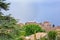 Daylight foggy view to Eze village with botanical garden full of