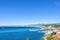 Daylight view to beachline and blue sea of Antibes, France