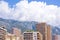 Daylight view to city buildings, mountains and sky of Monaco