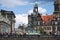 A daytime scene at the exterior of the Dresden Cathedral, Germany - crowded with tourists, sunny day