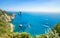 Daytime view of famous Faraglioni rocks near Capri island, Italy