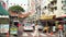 Daytime view of the restaurant and hawker stalls at Jalan Alor food street in Kuala Lumpur.