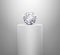 Dazzling diamond on shiny white pedestal podium. concept illuminated pedestal by spotlights on white background