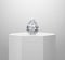 Dazzling diamond on Shiny white round pedestal podium