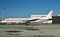 A DC-8 thatserved United Airlines for many years now waiting for its next owner .