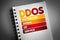 DDoS - Distributed Denial of Service acronym on notepad, technology concept background