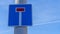 Dead end street road sign on blue sky background. A street sign indicates to drivers that the road is a dead end.