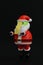 Dead Santa Claus Chinese zombie style with yellow talisman jumping at night, concept of accident and life insurance, 3D rendering
