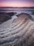 Dead sea first light over salt crystals shore - nature of Israel