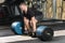 Deadlift attempt. Young man trying to lift heavy barbell