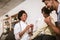 Deaf african american girl with ear implant at doctor`s office