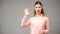 Deaf woman saying bye, asl teacher gesturing words in sign language, tutorial