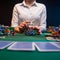 The dealer, or card dealer in a casino, holds a dealer chip. Poker game in a casino in Las Vegas