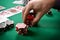 Dealer collects red poker chips