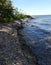 Deans Cove State Marine Park rocky beach shoreline on Cayuga Lake
