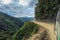 Death Road - July 25, 2017: Tour bus travelling in the Yungas road, or Death Road, Bolivia