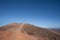 Death Valley, California. In the distance a man is photographing a woman.