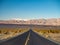 Death Valley, Mojave Desert lone empty road, California, USA: The hottest place on the planet Earth, black and white art photo