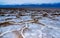 Death Valley National Park, Salt with clay, California. Smooth salt valley with cracked and swollen salt, dead salt landscape