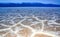 Death Valley National Park, Salt with clay, California. Smooth salt valley with cracked and swollen salt, dead salt landscape