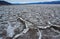 Death Valley National Park, Salt with clay, California. Smooth salt valley with cracked and swollen salt, dead salt landscape