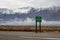 Death Valley Road Sign, Snowy Mountain Background.