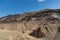 Death valley - Scenic view of colorful geology of multi hued Amargosa Chaos rock formations near Furnace Creek, California, USA.