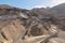 Death valley - Scenic view of colorful geology of multi hued Amargosa Chaos rock formations near Furnace Creek, California, USA.