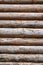 Debarked Rough Log Cabin Wall Vertical Background