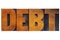 Debt word in wood type