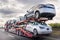 Dec 8, 2019 Bakersfield / CA / USA - Car transporter carries new Tesla vehicles along the interstate to South California, back