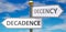 Decadence and decency as different choices in life - pictured as words Decadence, decency on road signs pointing at opposite ways