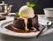 A decadent molten chocolate lava cake, with the center oozing with rich chocolate sauce