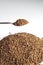 Decaffeinated coffee granules with spoon