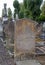 Decaying sandstone gravestone at the historic Victorian Jewish cemetery in Willesden, north west London.