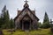 decaying wooden church with a crooked cross on top