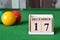 December 17, number cube with balls on snooker table, sport background.