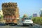 December 18 2022 - Karnataka, India: truck heavily overloaded with sugar cane is going to the factory