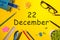 December 22nd. Day 22 of december month. Calendar on yellow businessman workplace background. Winter time