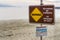 December 24, 2017 Morro Bay / CA / USA - Warning Recurring RIP currents No Lifeguard on Duty posted sign together with other