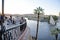 December 25, 2021, Aswan, Egypt. Visitors Enjoying High Tea And The Views At The Famous Cataract Hotel Overlooking The Nile River