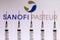 December 4, 2020, Brazil. In this photo illustration various medical syringes is seen with Sanofi Pasteur company logo displayed