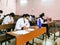 December 8, 2020.Lucknow Uttar Pradesh,India. West Bengal India. Medical students writing examination paper in mask