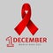 December Worlds Aids Day concept symbol with text and red ribbon of aids awareness and with man silhouette leaning on.