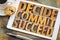 Decide, commit, succeed word abstract on tablet