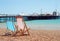 Deck chairs on the beach Brighton England